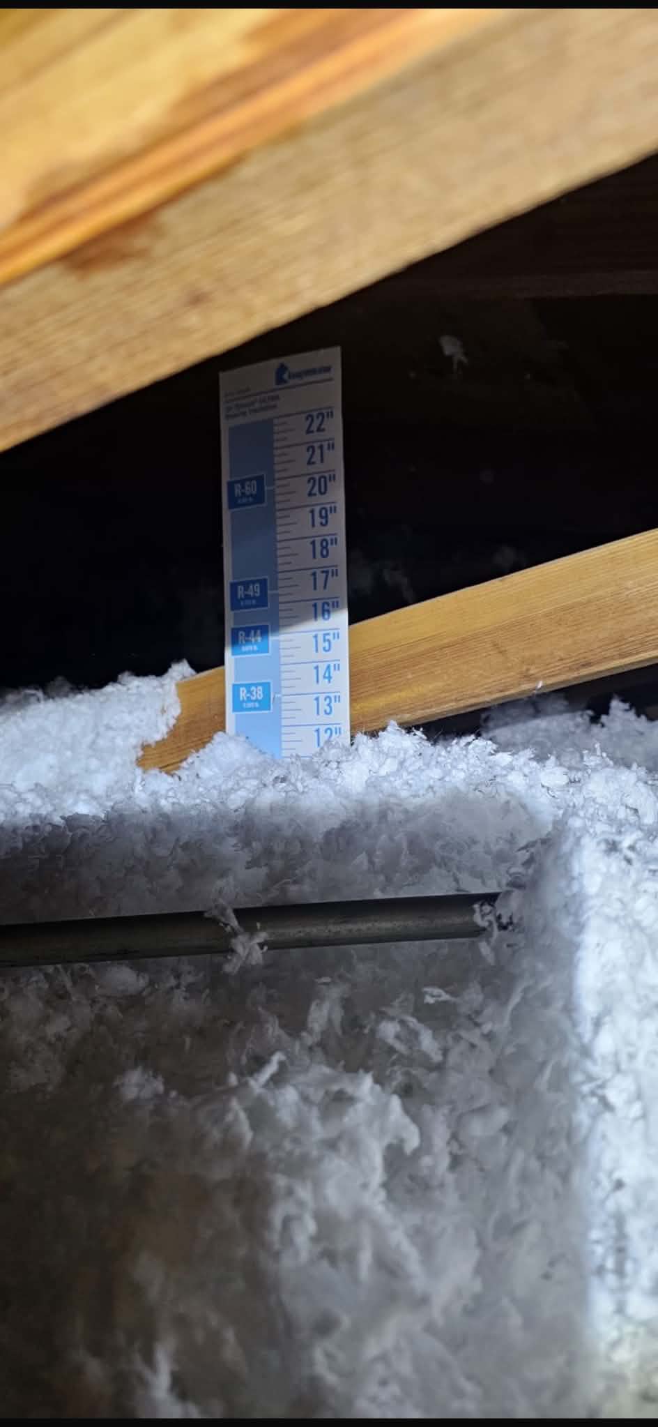 Attic ductwork after blown-in insulation installation in Florida